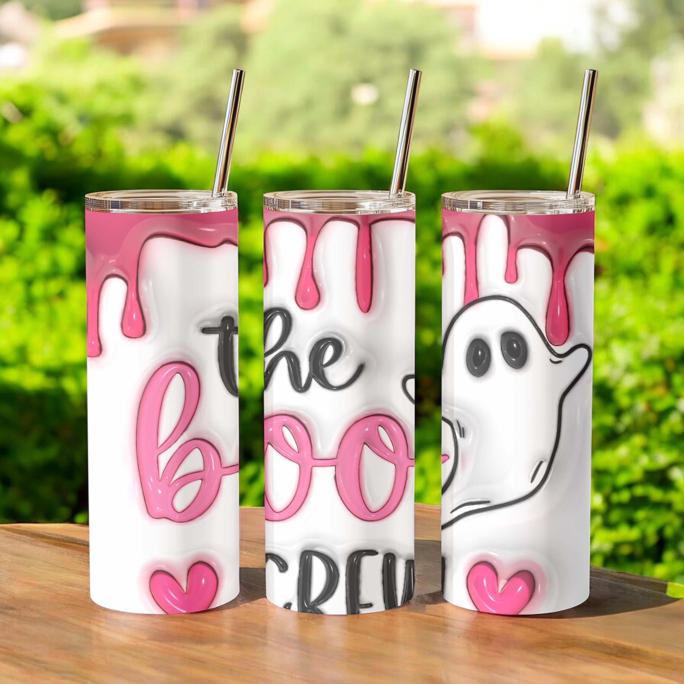 Sip in spooky style! The Boo Crew ghost tumbler features a pink drip design, 20oz insulated size, and comes with straw & lid – perfect for Halloween