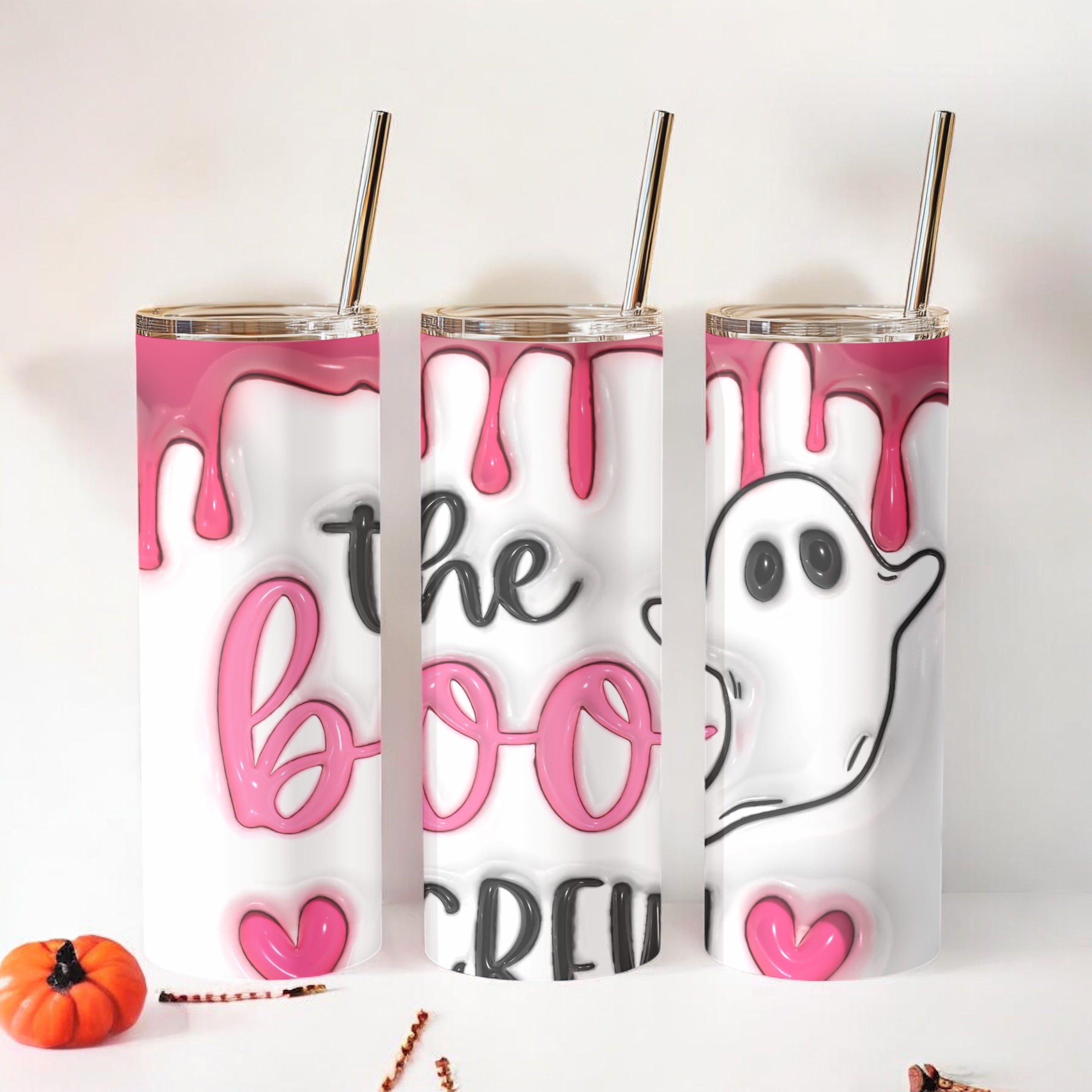 Sip in spooky style! The Boo Crew ghost tumbler features a pink drip design, 20oz insulated size, and comes with straw & lid – perfect for Halloween